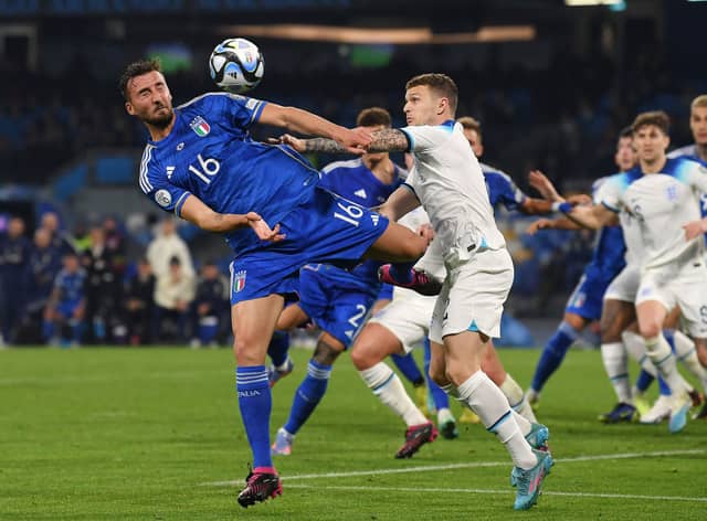NAPLES, ITALY - MARCH 23: Bryan Cristante of Italy battles for possession with Kieran Trippier of England during the UEFA EURO 2024 qualifying round group C match between Italy and England at Stadio Diego Armando Maradona on March 23, 2023 in Naples, Italy. (Photo by Francesco Pecoraro/Getty Images)