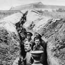 28th October 1914:  British soldiers lined up in a narrow trench during World War I.  (Photo by Hulton Archive/Getty Images)