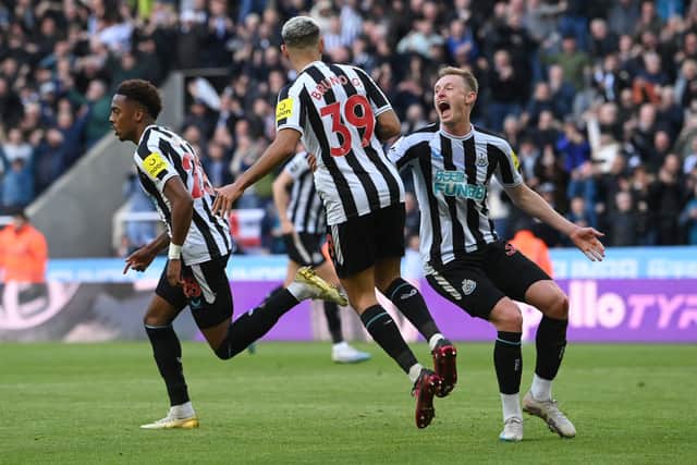 Newcastle United midfielder Joe Willock opens the scoring against Manchester United. (Photo by Stu Forster/Getty Images)