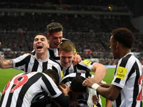 Miguel Almiron of Newcastle United celebrates after teammate Dan Burn of Newcastle United (hidden) scored the team's first goal during the Carabao Cup Quarter Final match between Newcastle United and Leicester City at St James' Park on January 10, 2023 in Newcastle upon Tyne, England. (Photo by Stu Forster/Getty Images)