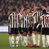 Joelinton of Newcastle United celebrates with teammates after scoring the team's second goal during the Premier League match between West Ham United and Newcastle United at London Stadium on April 05, 2023 in London, England. (Photo by Alex Pantling/Getty Images)