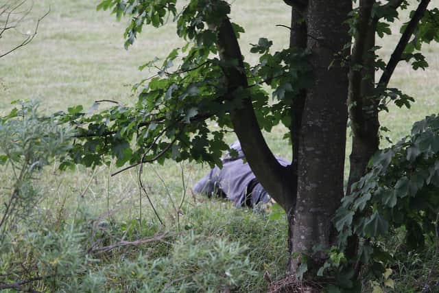 ULY 09: A man fitting the description of fugitive gunman Raoul Moat is seen as Police negotiate with him on July 9, 2010 in Rothbury, England.
