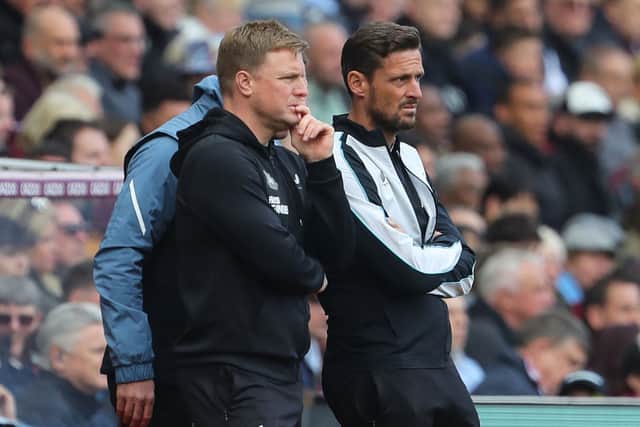 Newcastle United’s English head coach Eddie Howe (L) and Newcastle United’s assistant coach Jason Tindall (R) look on during the English Premier League football match between Aston Villa and Newcastle Utd at Villa Park in Birmingham, central England on April 15, 2023. (Photo by Geoff Caddick / AFP)