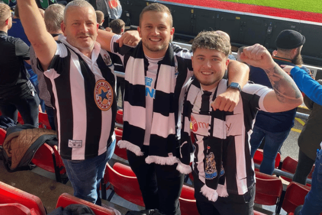 Scott (centre), his dad and brother follow Newcastle United from Hampshire.