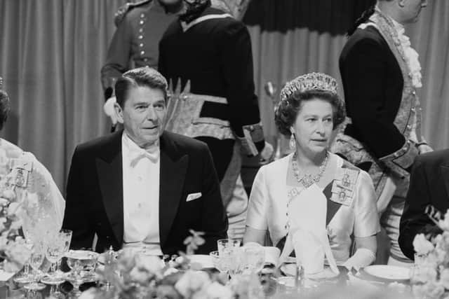 President Ronald Reagan and Queen Elizabeth II at a gala dinner at Windsor Castle in 1982. (photo: Getty Images)