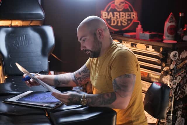 Working on a new tattoo design (photo: Barber DTS - Rebecca Lawton)