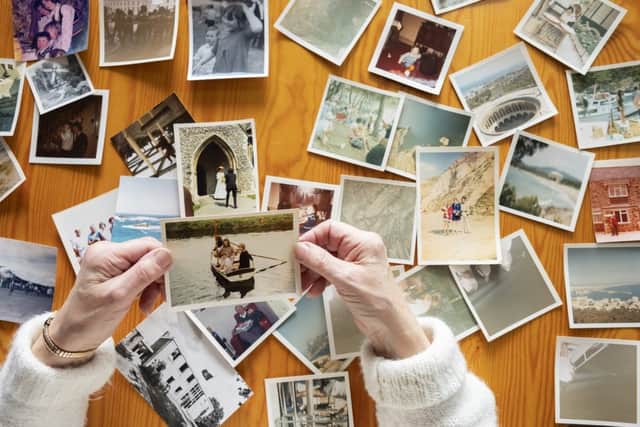 Fill a scrapbook with family photos for an alternative Mother's Day gift (photo: adobe)