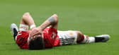 Bruno Fernandes of Manchester United lies injured during the Emirates FA Cup Semi Final match between Brighton & Hove Albion and Manchester United at Wembley Stadium on April 23, 2023 in London, England. (Photo by Matthew Peters/Manchester United via Getty Images)
