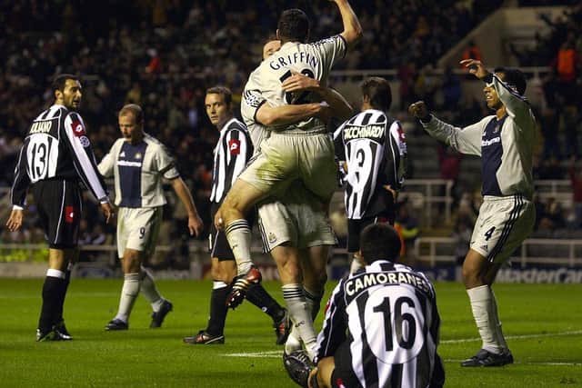 Newcastle celebrate the winning goal scored by Andy Griffin who is lifted up by Andy O' Brien as Nolberto Solano (r) joins in during the UEFA Champions League, Group E match between Newcastle United and Juventus at St. James' Park in Newcastle on October 23, 2002. (Photo By Stu Forster/Getty Images)