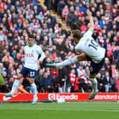 Harry Kane of Tottenham Hotspur scores the team’s first goal during the Premier League match between Liverpool FC and Tottenham Hotspur at Anfield on April 30, 2023 in Liverpool, England.