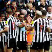 Alexander Isak of Newcastle United ( 2nd from left) celebrates after scoring the team’s fifth goal with team mates during the Premier League match between Newcastle United and Tottenham Hotspur at St. James Park on April 23, 2023 in Newcastle upon Tyne, England. (Photo by Clive Brunskill/Getty Images)