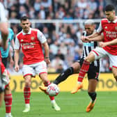 oelinton of Newcastle United battles for possession with Gabriel Martinelli of Arsenal during the Premier League match between Newcastle United and Arsenal FC at St. James Park on May 07, 2023 in Newcastle upon Tyne, England. (Photo by David Price/Arsenal FC via Getty Images)