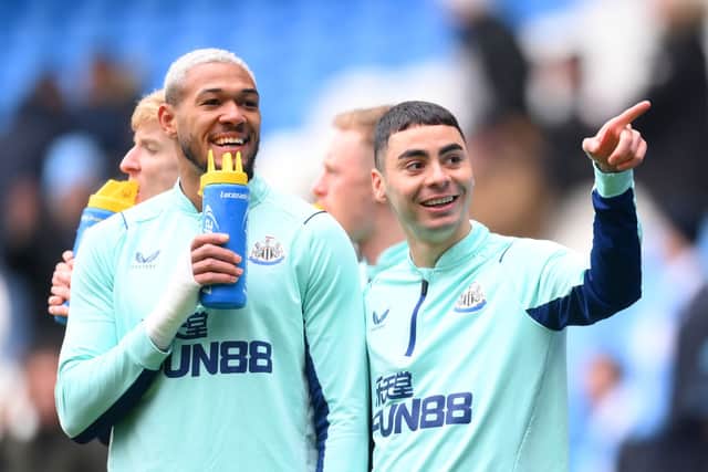 Newcastle United duo Joelinton (left) and Miguel Almiron (right). (Photo by Laurence Griffiths/Getty Images)