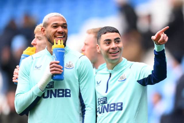 Newcastle United duo Joelinton (left) and Miguel Almiron (right). (Photo by Laurence Griffiths/Getty Images)