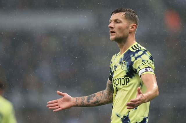 Leeds United captain Liam Cooper. (Photo by LINDSEY PARNABY/AFP via Getty Images)