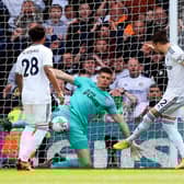 Leeds United's English defender Luke Ayling (R) scores the opening goal during the English Premier League football match between Leeds United and Newcastle United at Elland Road in Leeds, northern England, on May 13, 2023. (Photo by Lindsey Parnaby / AFP)