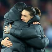 Liverpool boss Jurgen Klopp hugs Uruguayan forward Darwin Nunez.  (Photo by LINDSEY PARNABY/AFP via Getty Images)