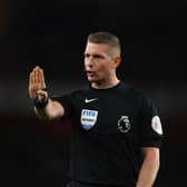  Referee Robert Jones during the Premier League match between Arsenal FC and Chelsea FC at Emirates Stadium on May 02, 2023 in London, England. (Photo by Alex Pantling/Getty Images)