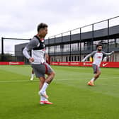 Roberto Firmino, Fabinho and Mohamed Salah of Liverpool during a training session at AXA Training Centre on May 17, 2023 in Kirkby, England. (Photo by Andrew Powell/Liverpool FC via Getty Images)