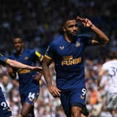 Callum Wilson of Newcastle celebraters with Miguel Almiron after scoring the second Newcastle goal from the penalty spot during the Premier League match between Leeds United and Newcastle United at Elland Road on May 13, 2023 in Leeds, England. (Photo by Stu Forster/Getty Images)