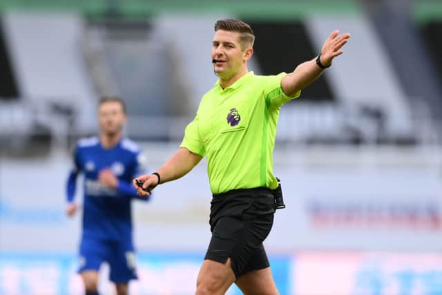 Referee Robert Jones makes a decision during the Premier League match between Newcastle United and Leicester City at St. James Park on January 03, 2021.