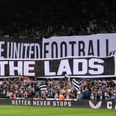 NEWCASTLE UPON TYNE, ENGLAND - MAY 18: Fans of Newcastle United display a 'Howay the lads' tifo banner prior to the Premier League match between Newcastle United and Brighton & Hove Albion at St. James Park on May 18, 2023 in Newcastle upon Tyne, England. (Photo by Stu Forster/Getty Images)