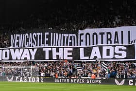 NEWCASTLE UPON TYNE, ENGLAND - MAY 18: Fans of Newcastle United display a 'Howay the lads' tifo banner prior to the Premier League match between Newcastle United and Brighton & Hove Albion at St. James Park on May 18, 2023 in Newcastle upon Tyne, England. (Photo by Stu Forster/Getty Images)