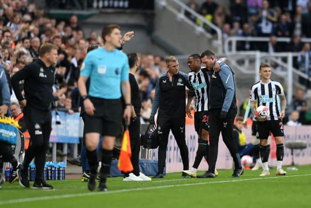 Joe Willock of Newcastle United leaves the pitch after picking up an injury during the Premier League match between Newcastle United and Brighton & Hove Albion at St. James Park on May 18, 2023 in Newcastle upon Tyne, England. (Photo by Stu Forster/Getty Images)