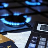 Gas stove, bank cards and calculator 