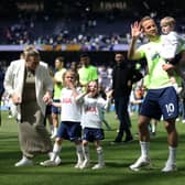  Harry Kane of Tottenham Hotspur acknowledges the fans with his family after the final whistle (Photo by Julian Finney/Getty Images)