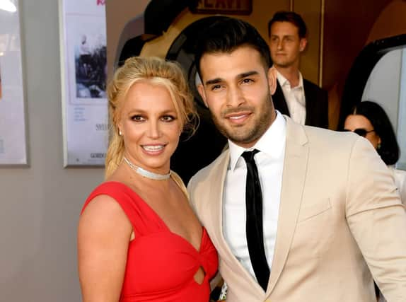 Britney Spears and Sam Asghari arrive at the premiere of Sony Pictures' "One Upon A Time...In Hollywood" (Photo: Kevin Winter/Getty Images)