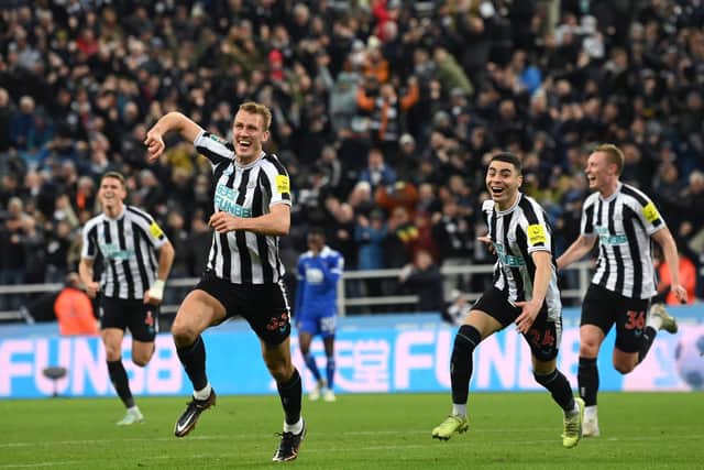 Newcastle player Dan Burn celebrates after scoring the opening goal during the Carabao Cup Quarter Final match between Newcastle United and Leicester City at St James’ Park on January 10, 2023 in Newcastle upon Tyne, England.