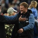 Eddie Howe, Manager of Newcastle United, and Yasir Al-Rumayyan chairman of Newcastle United interact after their team qualifies for the UEFA Champions League following the Premier League match between Newcastle United and Leicester City at St. James Park on May 22, 2023 in Newcastle upon Tyne, England. (Photo by Stu Forster/Getty Images)