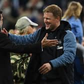 Eddie Howe, Manager of Newcastle United, and Yasir Al-Rumayyan chairman of Newcastle United interact after their team qualifies for the UEFA Champions League following the Premier League match between Newcastle United and Leicester City at St. James Park on May 22, 2023 in Newcastle upon Tyne, England. (Photo by Stu Forster/Getty Images)