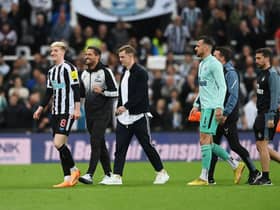 Newcastle United goalkeeper Martin Dubravka, third right, after the club qualified for the Champions League.