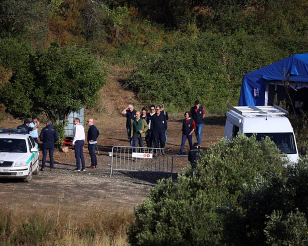 Portuguese Judicial Police criminal investigation unit members prepare at the base camp near the Arade dam, in Silves, on 24 May, 2023 on the second day of a new search operation amid the investigation into the disappearance of Madeleine McCann. (Photo by FILIPE AMORIM / AFP) (Photo by FILIPE AMORIM/AFP via Getty Images)