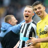 Newcastle United pair Sean Longstaff (left) and Nick Pope (right). (Photo by LINDSEY PARNABY/AFP via Getty Images)