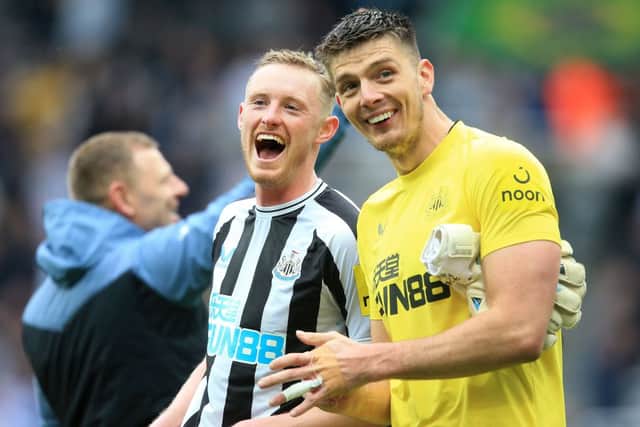 Newcastle United pair Sean Longstaff (left) and Nick Pope (right). (Photo by LINDSEY PARNABY/AFP via Getty Images)