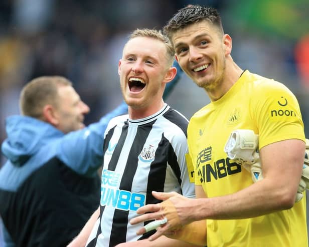 Newcastle United pair Sean Longstaff (left) and Nick Pope (right). (Photo by LINDSEY PARNABY/AFP via Getty Images)