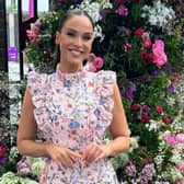 Vicky wore a pink floral dress with a ruffle neck and sleeves from British luxury brand  Anne Louise Boutique. (Picture: Instagram/@vickypattison)