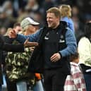 Newcastle head coach Eddie Howe celebrates with chairman Yasir Al-Rumayyan after the Premier League match between Newcastle United and Leicester City at St. James Park on May 22, 2023 in Newcastle upon Tyne, England.