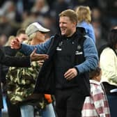Newcastle head coach Eddie Howe celebrates with chairman Yasir Al-Rumayyan after the Premier League match between Newcastle United and Leicester City at St. James Park on May 22, 2023 in Newcastle upon Tyne, England.
