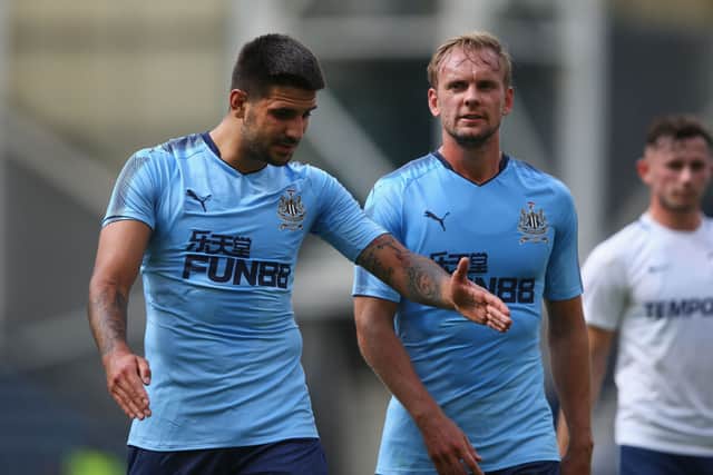 Aleksandar Mitrovic and Siem De Jong of Newcastle United talk during a pre-season friendly match between Preston North End and Newcastle United at Deepdale on July 22, 2017 in Preston, England.