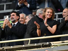 Newcastle United’s Saudi Arabian chairman Yasir Al-Rumayyan (L) and Newcastle United’s English minority owner Amanda Staveley (C) applaud the players ahead of the English League Cup final football match between Manchester United and Newcastle United at Wembley Stadium, north-west London on February 26, 2023. 