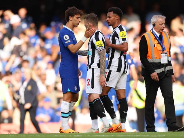 Joao Felix of Chelsea interacts with Kieran Trippier and Jacob Murphy of Newcastle United following the Premier League match between Chelsea FC and Newcastle United at Stamford Bridge on May 28, 2023.