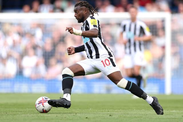 Allan Saint-Maximin of Newcastle United controls the ball during the Premier League match between Chelsea FC and Newcastle United at Stamford Bridge on May 28, 2023 in London, England.