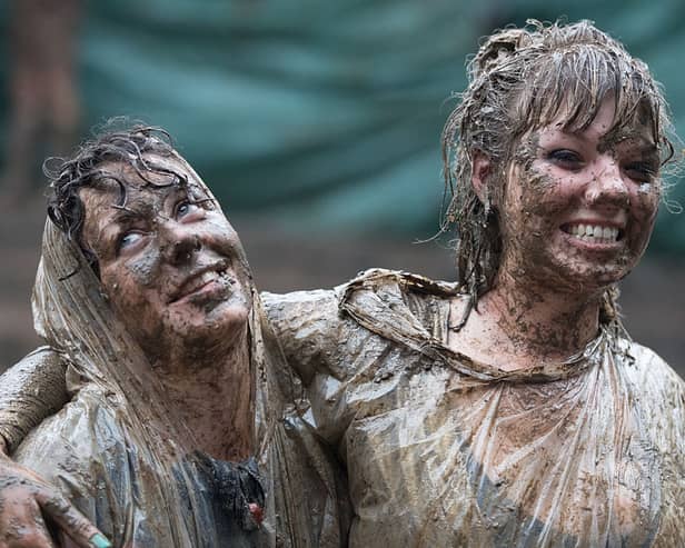 Muddy festival goers at Glastonbury will be able to get a free shower this year