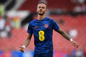 James Maddison warms up for England