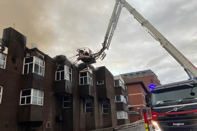 Firefighters worked through the night to bring the fire under control. Photo: TWFRS.