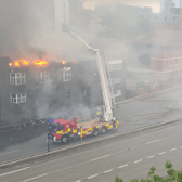 Newcastle’s Central Motorway was closed as firefighters tackled the blaze. Photo: Adam Bartch.